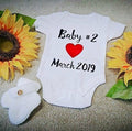 New baby announcement baby grow